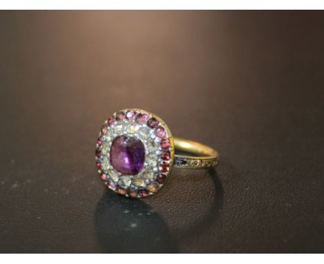 AN ANTIQUE MOURNING RING, set with amethysts and diamonds along with woven hair under a crystal, approx weight 4.2g, ring siz