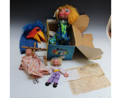 A PELHAM VENTRILOQUIAL PUPPET, with original box, together with an 'Emu' hand puppet and two smaller stringed puppets, H 34.5