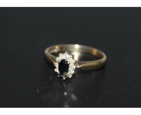 A HALLMARKED 9 CARAT GOLD SAPPHIRE AND DIAMOND RING, approx weight 1.9g, ring size N 1/2