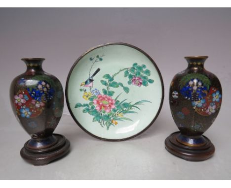 A PAIR OF ORIENTAL MINIATURE CLOISONNE VASES, H 9.2 cm, with associated hardwood stands, together with a Chinese circular met