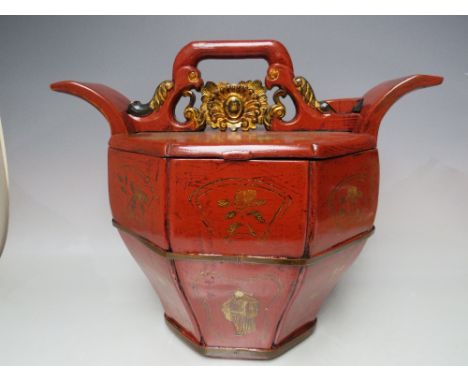 AN ANTIQUE CHINESE RED LACQUERED TEAPOT WARMER,  with carved detail to the body, H 32.5, W 39.5 cm