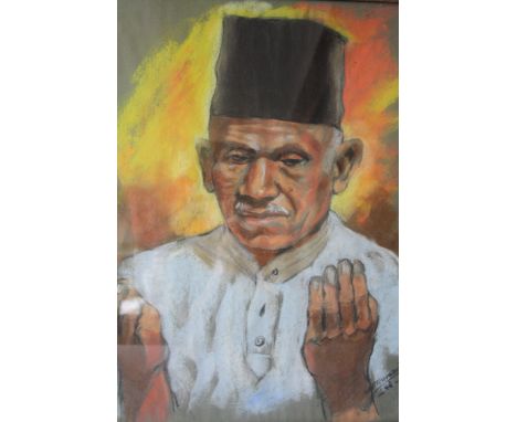 SAPTO HOEDOJO (XX). A portrait study of a young Indonesian man, signed and dated 1948 lower right, pastel on paper, framed an