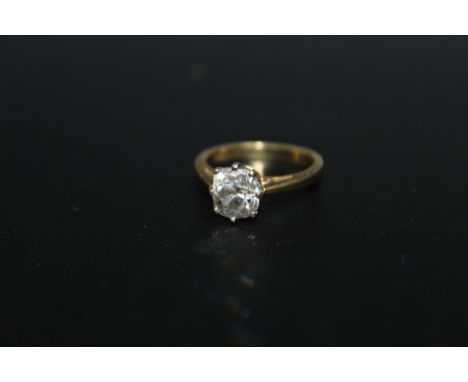 A HALLMARKED 18 CARAT  OLD CUT DIAMOND SOLITAIRE RING, the single stone being of a good colour and totalling an estimated 1.6