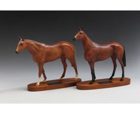 TWO LARGE BESWICK RACEHORSES ON PLINTHS, consisting of Red Rum and Grundy, H 28 cm, both marked as seconds