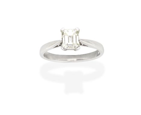 DIAMOND SINGLE-STONE RINGThe step-cut diamond, weighing 1.00 carat, mounted in 18 carat white gold, UK hallmark, ring size ap