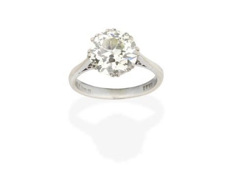 DIAMOND SINGLE-STONE RING, 1977Set with a brilliant-cut diamond, weighing 2.88 carats, mounted in 18 carat white gold, London