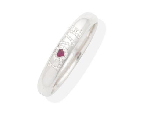 CHOPARD: DIAMOND AND RUBY 'HAPPY DIAMONDS LOVE' BANGLEThe hinged bangle, depicting the word 'LOVE' with brilliant-cut diamond