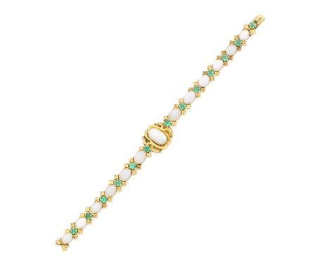 OPAL AND EMERALD BRACELET, MID 19TH CENTURYSet with alternating oval opal cabochons and step-cut emeralds, with scrolling and