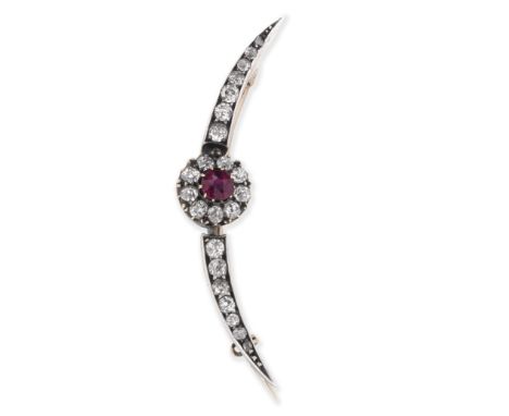 RUBY AND DIAMOND CRESCENT BROOCH, CIRCA 1890The central cluster set with a circular-cut ruby in a cushion-shaped diamond surr