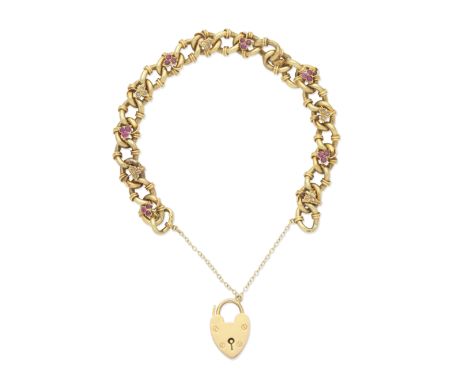 RUBY AND DIAMOND BRACELET, 1907The gold curb link bracelet with applied foliate motifs, alternately set with rose-cut diamond