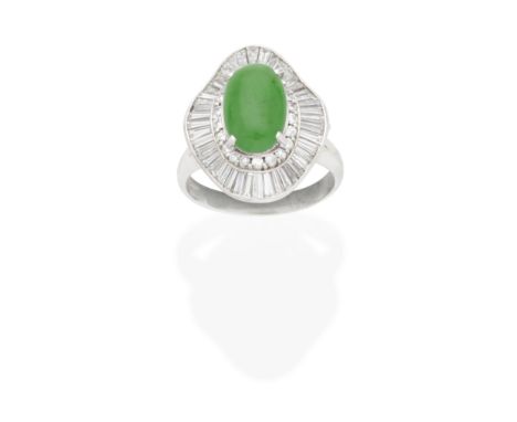 JADE AND DIAMOND BALLERINA RINGThe oval jadeite jade double cabochon within an undulating surround of brilliant and tapered b