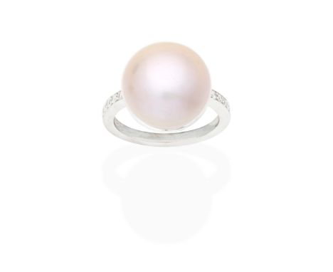 GRAFF: CULTURED PEARL AND DIAMOND RINGSet with a 15.3-15.4mm cultured button pearl of pink tint, the gallery and shoulders se