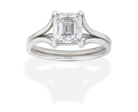 DIAMOND SINGLE-STONE RINGThe step-cut diamond, weighing 2.17 carats, between bifurcated shoulders, mounted in platinum, maker