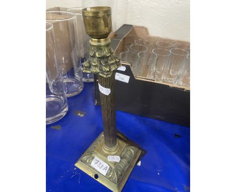 A brass Corinthian column lamp base