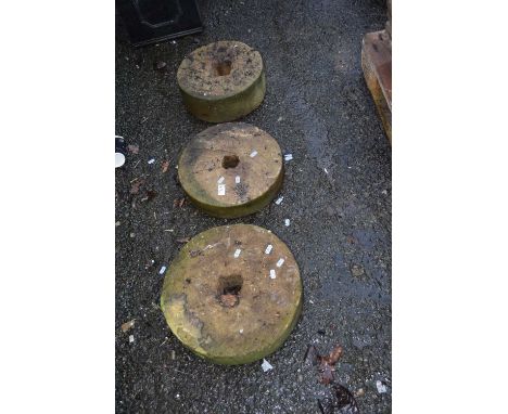 Three various vintage grind stones