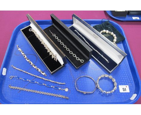 925 and Other Modern Bracelets, a modern bangle with collet set detail.  