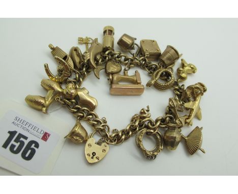A 9ct Gold Curb Link Charm Bracelet, to 9ct gold heart shape padlock style clasp, suspending numerous assorted novelty charm 