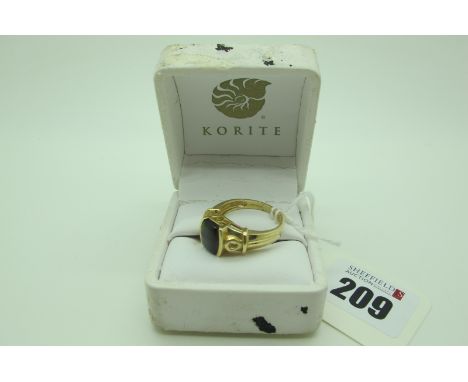 Korite; A Modern 14ct Gold Canadian Ammolite Single Stone Ring, semi collet set, also stamped "14K" (finger size R) (5.7grams