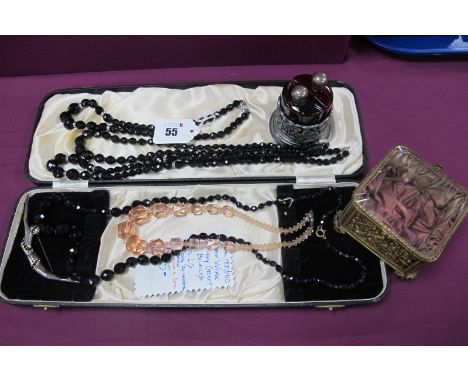 French Jet and Other Vintage Bead Necklaces, a decorative gilt metal French trinket box, of square form, gilt lined with beve