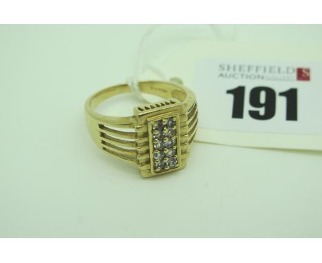 A Modern GemsTV 9ct Gold Panel Ring, the rectangular panel with inset highlights, between plain pierced tapering shoulders (f