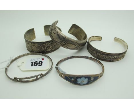 925 and Other Bangles, including example detailed in relief with elephants, a Modernist style cuff bangle, another detailed w