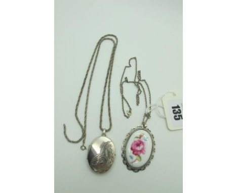 A Hallmarked Silver Mounted Coalport Oval Ceramic Panel Pendant, Birmingham 1979, on a chain; a hallmarked silver oval locket