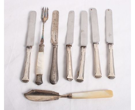 A Georgian silver butter knife with mother-of-pearl handle, a mother-of-pearl handled pickle fork, a set of five silver handl