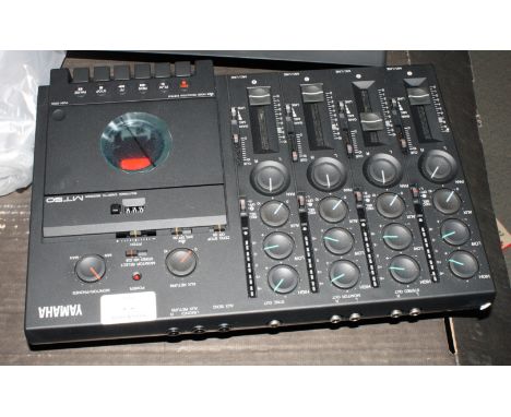 A Zoom Right Track 234 drum synthesizer and a Yamaha MT 50 multi-tracked cassette recorder