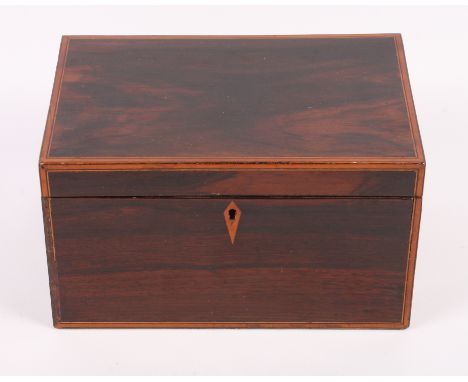 A George III mahogany and crossbanded two-division tea caddy, 9" wide