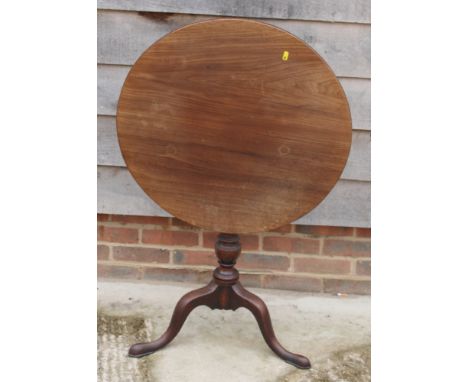 A Georgian mahogany circular tilt top occasional table, on tripod base, 27" dia