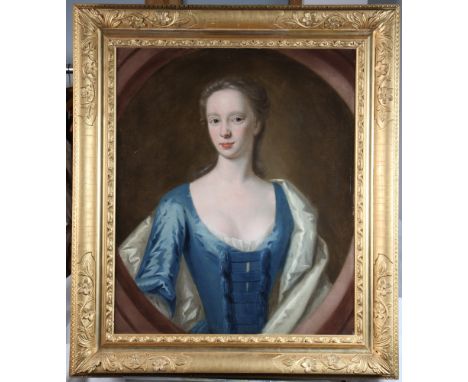 An 18th Century oil painting, portrait of a lady in a blue dress within an oval, relined canvas, 30" x 25", in gilt gesso dec