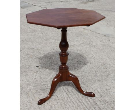 A 19th Century octagonal occasional table with fruitwood top, on turned tripod base, 22" wide