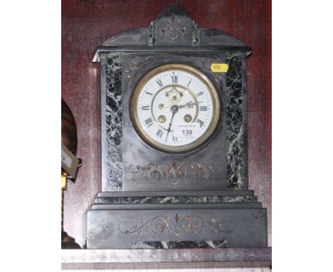 A late 19th Century slate and green marble set mantel clock with cylinder movement and escapement, 16" high