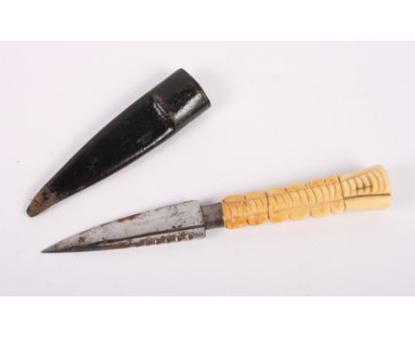 A 19th Century Scottish sgian dubh with ivory handle, 6 3/4" long overall, with leather scabbard