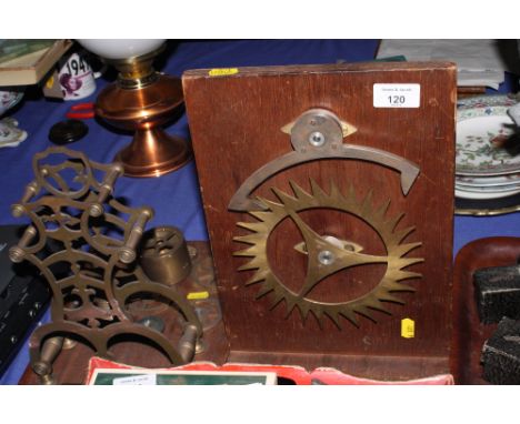 A scale model of an anchor escapement and a deconstructed skeleton clock on mahogany base