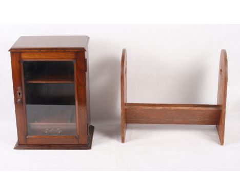 A smoker's walnut cabinet with glazed door and an oak book trough