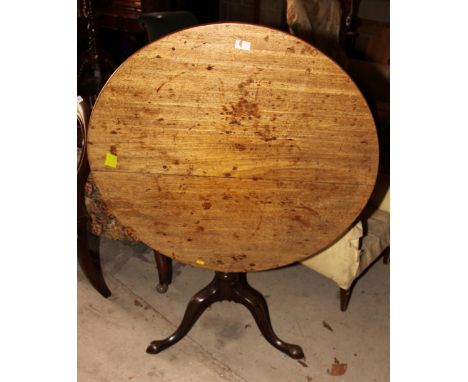 A George III oak circular tilt top occasional table, on tripod base, 36" dia