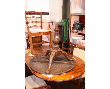 A Georgian oak occasional table with birdcage fitment, on tripod base