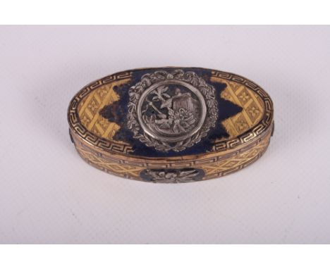 An engraved gilt metal and silver mounted oval snuff box, 3 1/2" wide