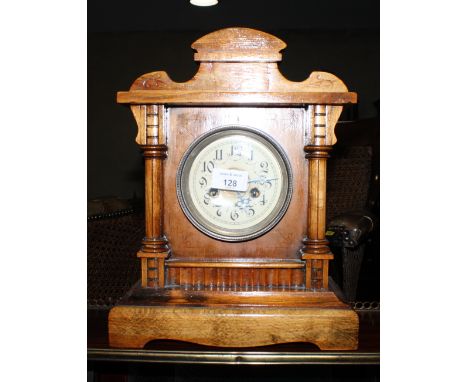 A late 19th Century polished as walnut mantel clock with eight-day movement