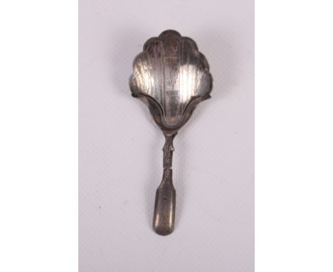 A Georgian silver caddy spoon with shaped bowl