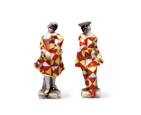 A Doccia pair of figures of Arlecchina and Arlecchino from the Commedia dell'Arte, circa 1765-70Decorated in yellow, white an