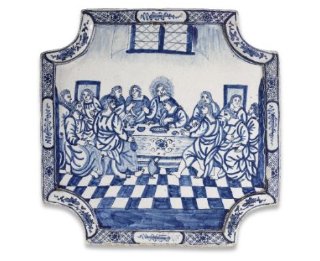 A Dutch Delftware plaque, likely Amsterdam, 18th centuryDepicting the Last Supper, of quadrangular shape with curved corners,