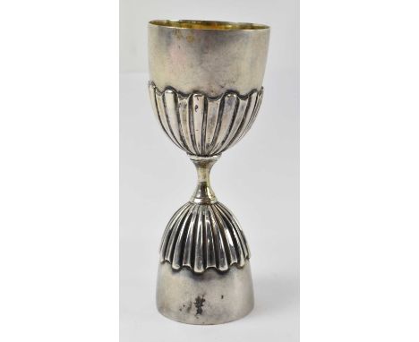 A hallmarked silver shot measure marked 'BS &amp; Co', height 11cm, approx 2.9ozt/92g.Condition Report: Small dent to each ri