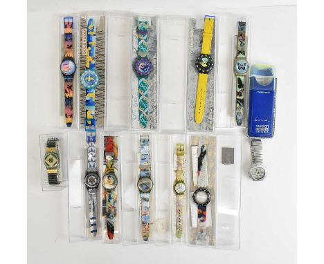 A group of eleven Swatch watches including the Miran Fukuda watch, Scuba 200 and two Scuba diving to 200 metres watches etc.
