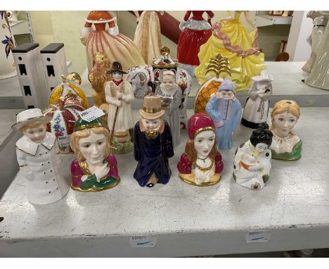 ROYAL WORCESTER; a collection of fifteen assorted candle snuffers.
