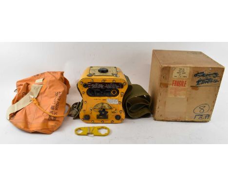 A WWII radio transmitter for use in aircrafts and dinghies, in original box and with waterproof bag. 