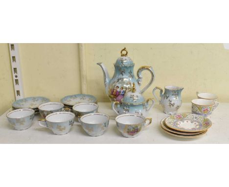 ROYAL WORCESTER; a pair of hand painted coffee cups on saucers and another matching saucer, and a modern German six setting t