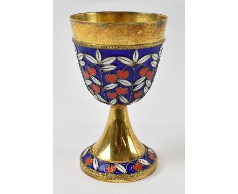 A Russian hallmarked silver gilt and enamel goblet, height 8cm, approx 2.3ozt/73.5g.