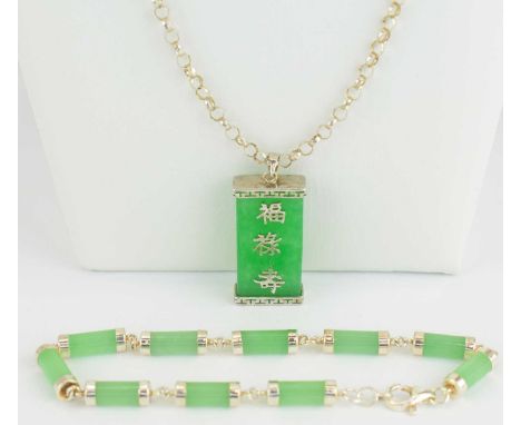A modern Chinese jade style silver mounted tablet pendant on silver belcher thin chain together with a modern jade barrel and